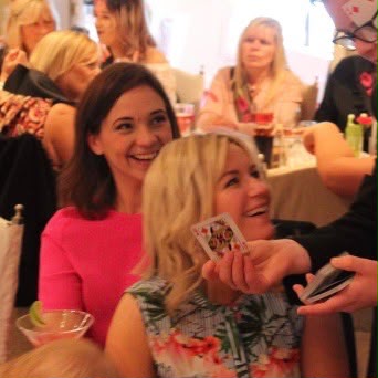 Guests reacting to close-up magic