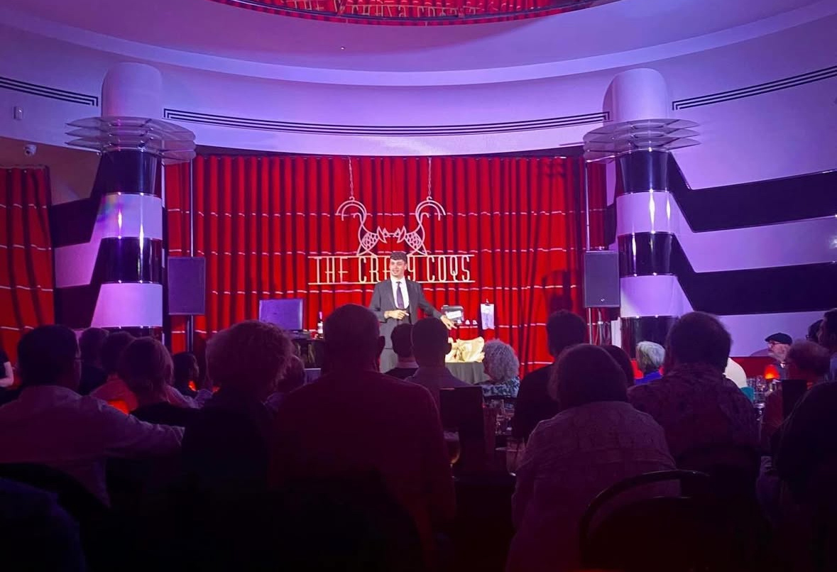 Magician performing in a cabaret venue